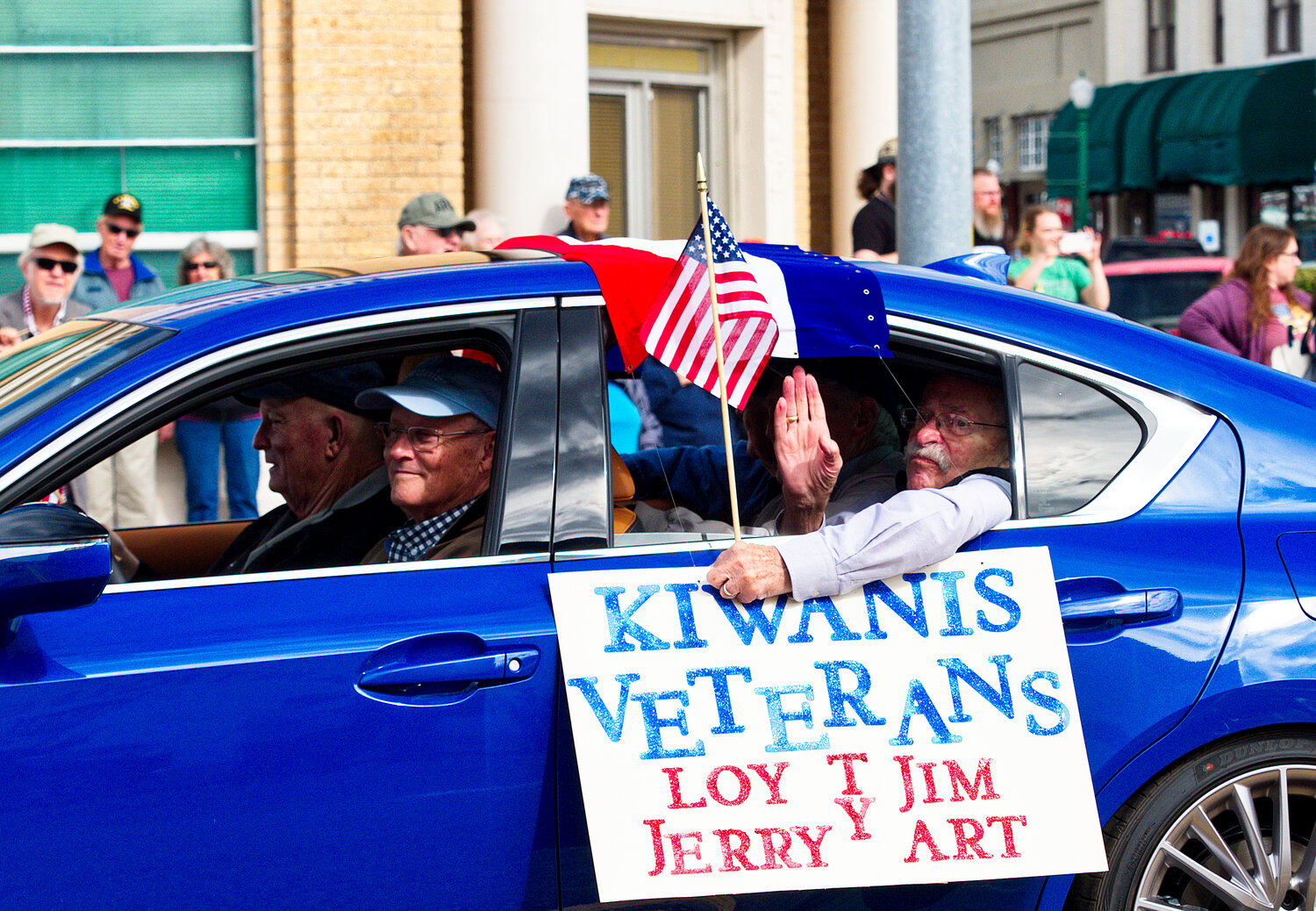 Kiwanians whose served [various Veterans Day views]